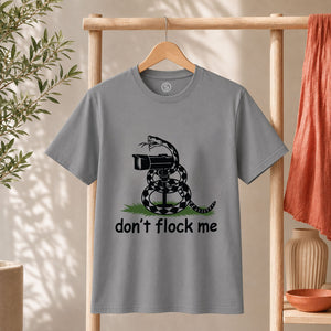 Dont Flock Me Snake With Camera T Shirt surveillance tee with humorous snake design on a gray background.