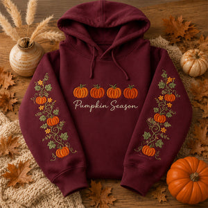 Pumpkin Season Embroidered Hoodie featuring charming pumpkins and autumn foliage details, perfect for fall.