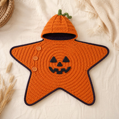 Orange pumpkin crochet star baby blanket with jack-o'-lantern face.