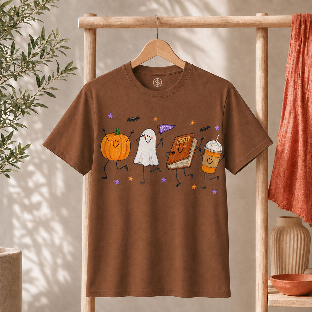Cute Halloween Doodles Shirt featuring playful doodles of a pumpkin, ghost, and hot drink, perfect for fall festivities.