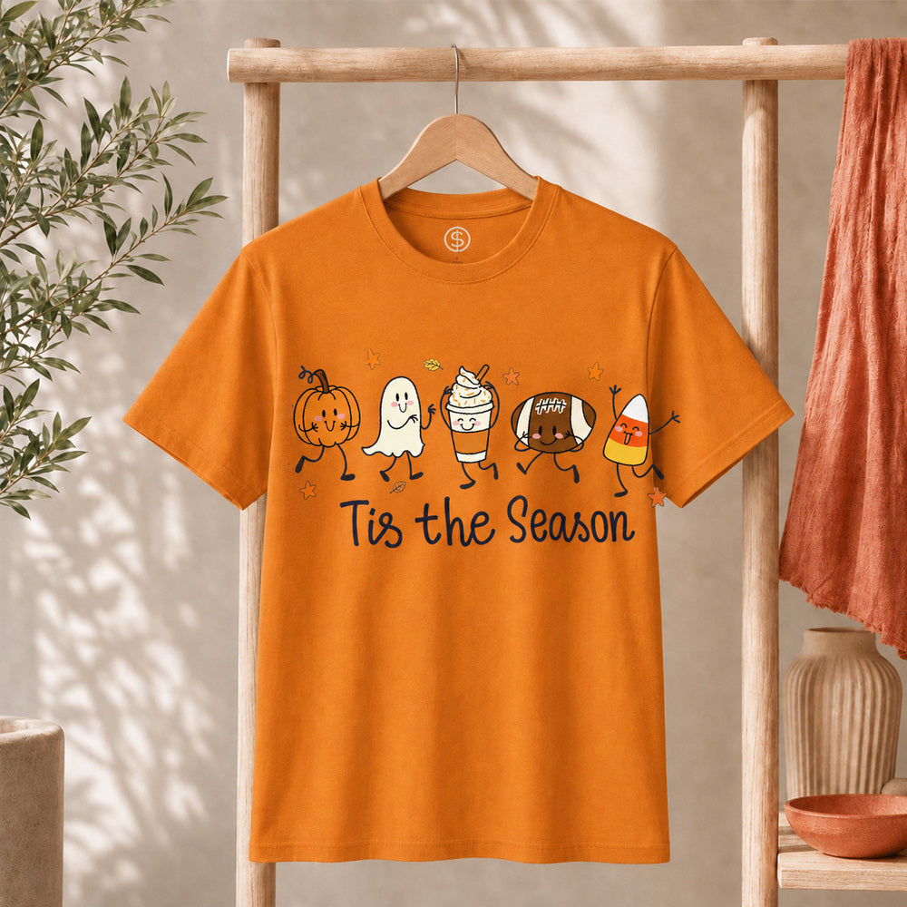 Cute Halloween Pumpkin Ghost Football Coffee Candy Corn Shirt displayed on an orange t-shirt.