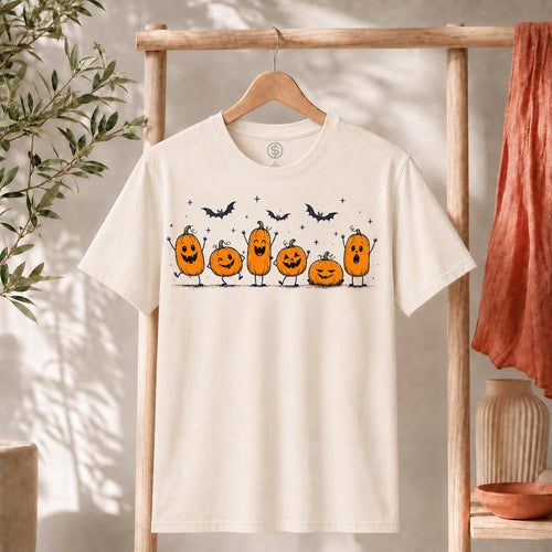 Cute Halloween Pumpkin Shirt featuring cheerful pumpkins and playful bats, perfect for the spooky season.