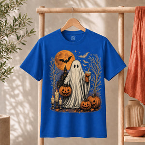 Ghost Halloween Shirt featuring a friendly ghost with an iced coffee, pumpkins, and a spooky backdrop.