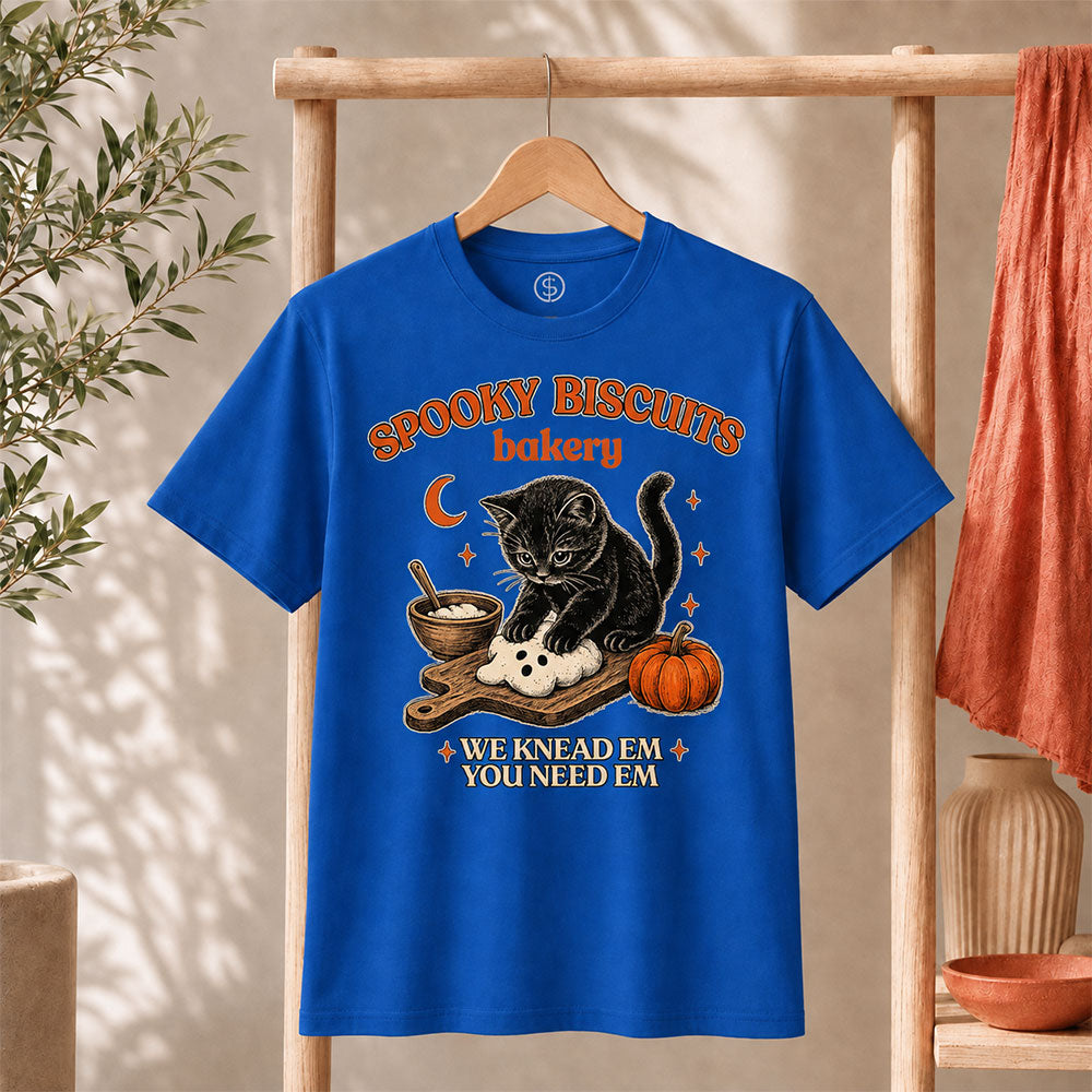 Kitty Biscuits Shirt Spooky Season T-shirt featuring a black cat design, pumpkins, and bakery theme for Halloween.