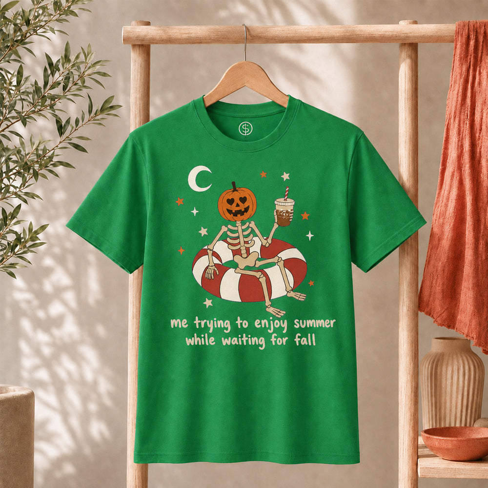 Me Trying to Enjoy Summer While Waiting for Fall Tee featuring a skeleton with pumpkin head on a pool float.