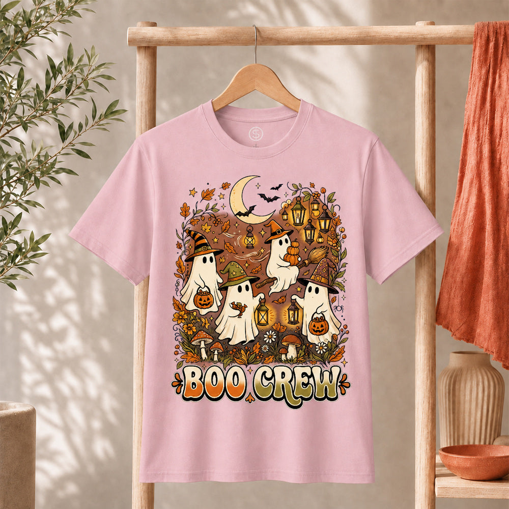 Retro Boo Crew Ghost Vintage Halloween T-Shirt featuring cute ghosts, pumpkins, and autumn elements on a pink shirt.