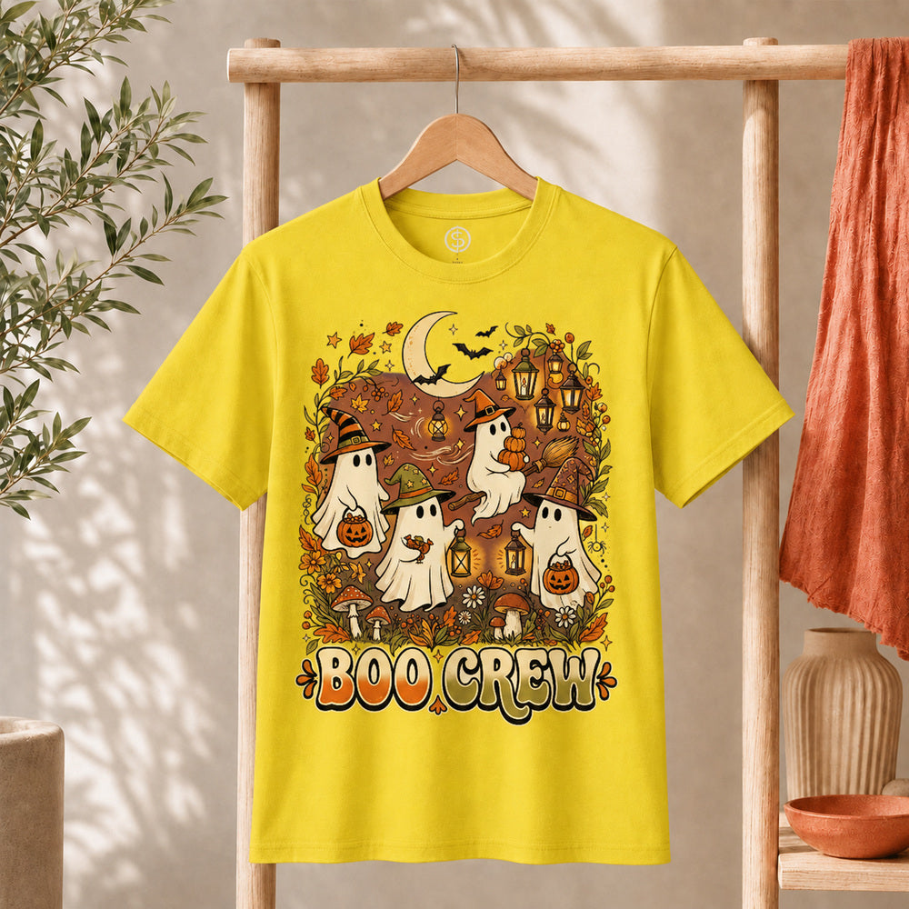 Retro Boo Crew Ghost Vintage Halloween T-Shirt featuring friendly ghosts and autumn decorations on a yellow t-shirt.