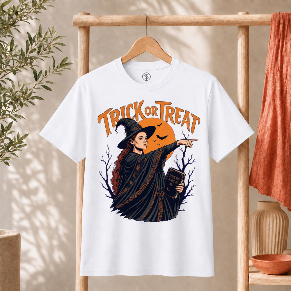 Sophie Trick Or Treat Shirt featuring a witch pointing under an orange moon with Trick or Treat lettering.