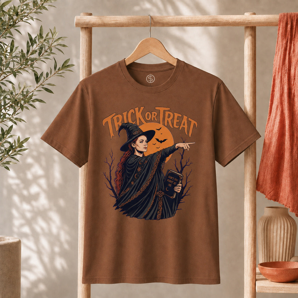 Sophie Trick Or Treat Shirt with witch design, Trick or Treat lettering, and orange moon backdrop.
