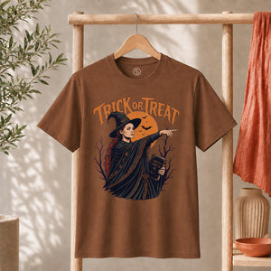 Sophie Trick Or Treat Shirt with witch design, Trick or Treat lettering, and orange moon backdrop.