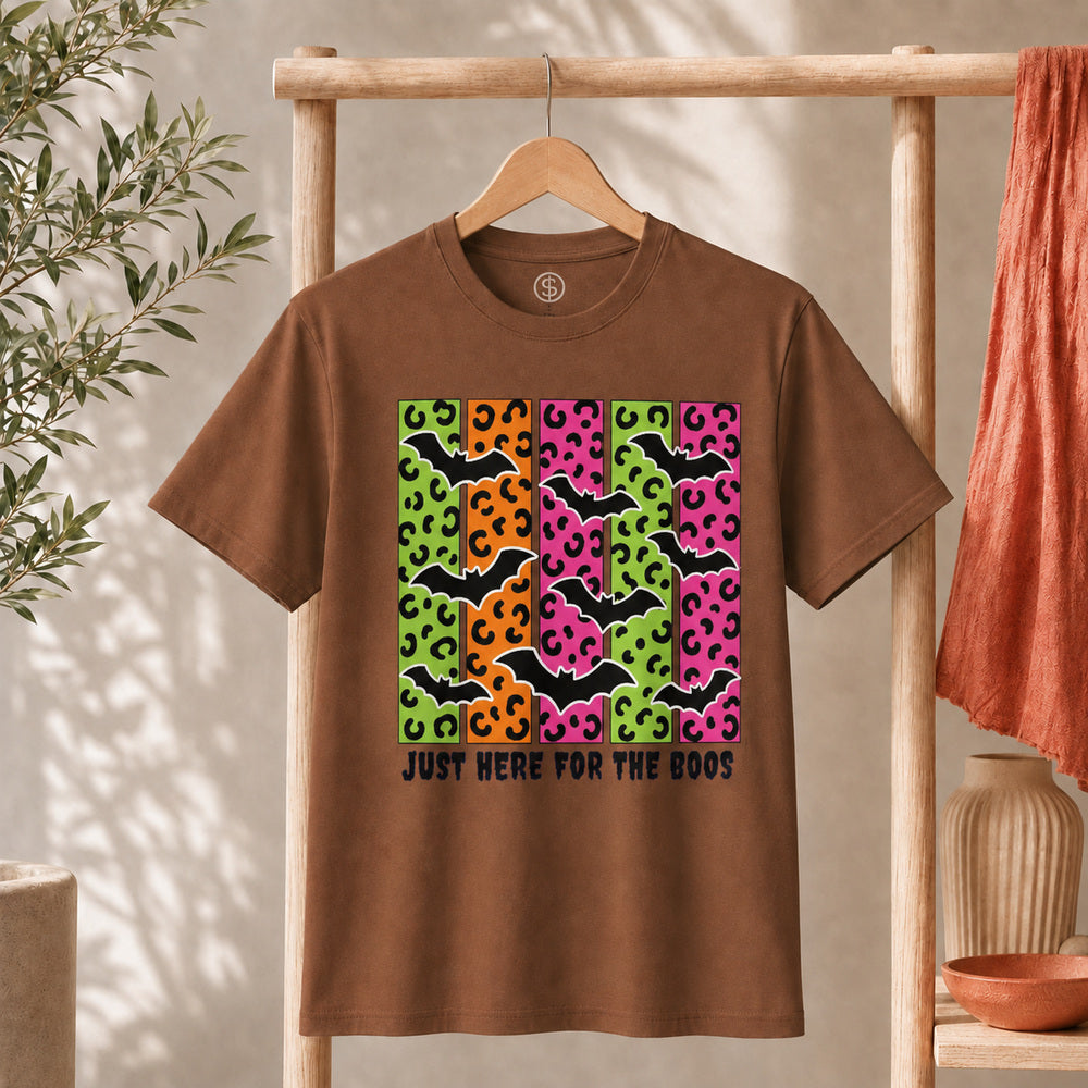 Spooky Bats Graphic Tee featuring colorful bats and the phrase 'Just Here for the Boos' for Halloween.